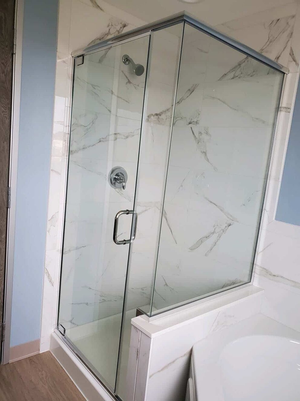Glass shower in modern bathroom at Anacortes hotel | Salish Inn